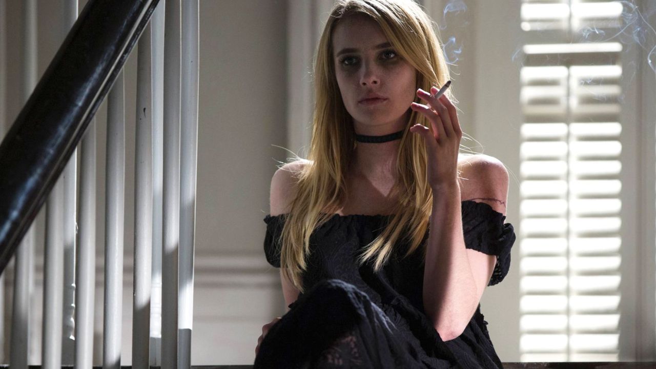 Emma Roberts & Kim K Play with a Spider in American Horror Story S12 Poster